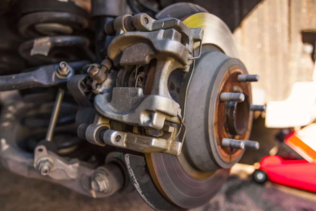 Car caliper with suspension and brake pads x