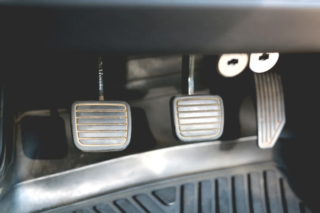 Brake First, Clutch Later for Safe Driving